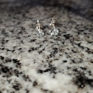 Diamond stud earrings with screw back attachment